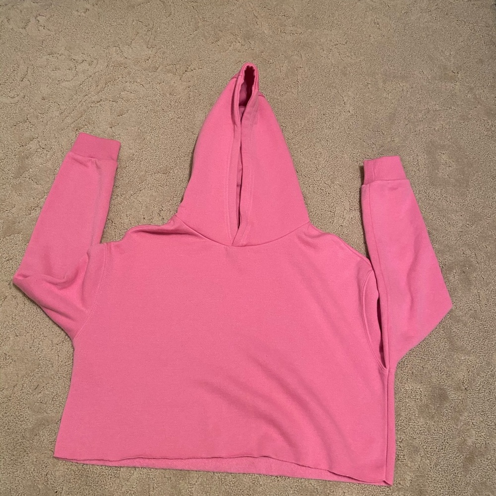 Pink colored hoodie